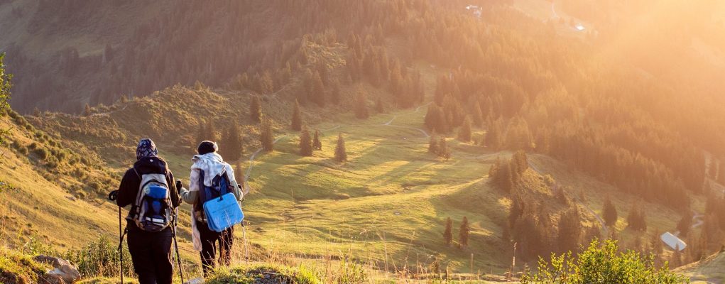 Two hikers walking into the hills