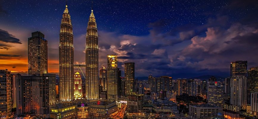 Malaysian city at night illuminated by lights